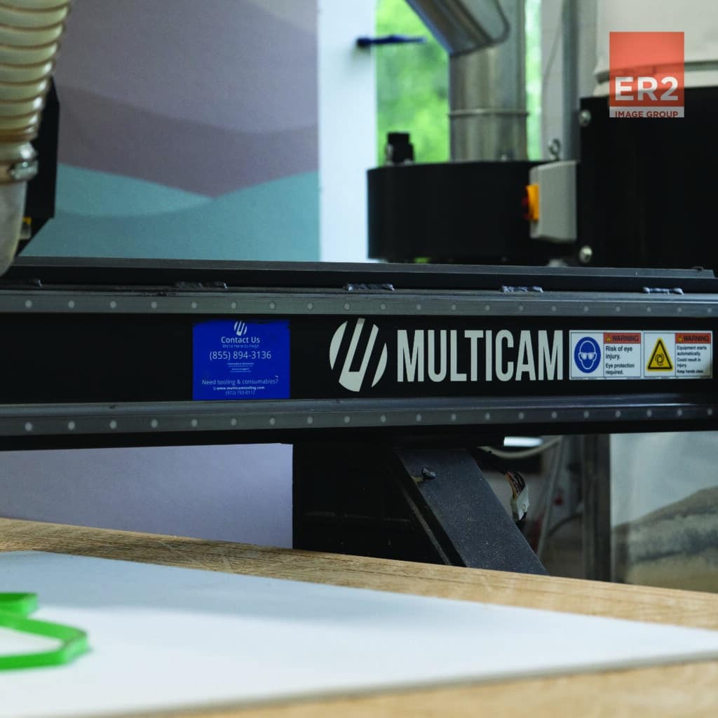 Custom metal signs (and many other materials) are made for ER2 Image Group and its Apex3R CNC Router from MultiCam.