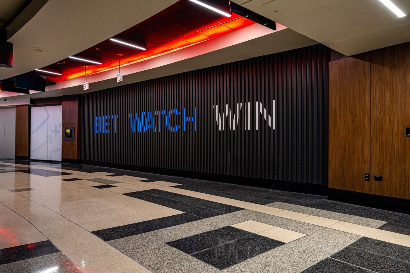 Dimensional lettering on a dark textured wall